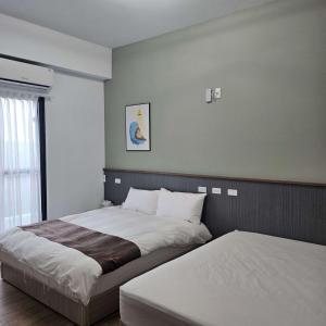 Postel nebo postele na pokoji v ubytování Happy Villa Sea View B&B