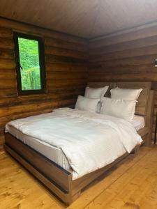 Postel nebo postele na pokoji v ubytování Wald Hotel Lagodekhi Rooms