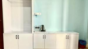Kuchyň nebo kuchyňský kout v ubytování PS Boutique Hotel + 35 fotografií
