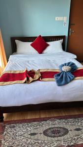 Postel nebo postele na pokoji v ubytování PS Boutique Hotel