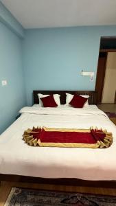 Postel nebo postele na pokoji v ubytování PS Boutique Hotel