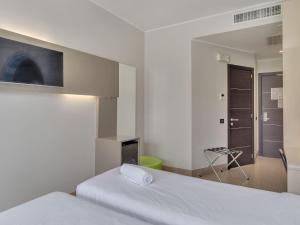 Postel nebo postele na pokoji v ubytování B&B Hotel Como Camerlata