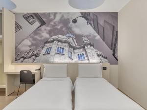 Postel nebo postele na pokoji v ubytování B&B Hotel Como Camerlata