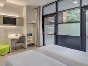 Postel nebo postele na pokoji v ubytování B&B Hotel Como Camerlata