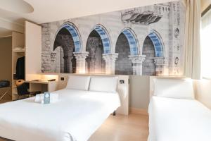 Postel nebo postele na pokoji v ubytování B&B Hotel Como Camerlata