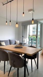 Et opholdsområde på Monoambiente Edificio DOMUS Full GYM Piscina Infinita Laundry Seguridad24hs