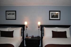 Postel nebo postele na pokoji v ubytování Rest Inn