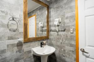 Ένα μπάνιο στο Pucón Rec-Lodge Cabaña Martín Pescador