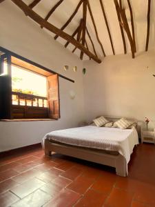 Postel nebo postele na pokoji v ubytování Nido