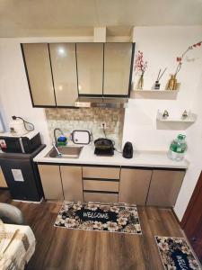 Kuchyň nebo kuchyňský kout v ubytování Baguio Breeze Encore Studio Condo + 1 fotografie