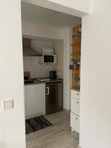 Η κουζίνα ή μικρή κουζίνα στο 1bd Apartment close to beach +27 φωτογραφίες