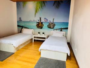 two beds in a room with a painting of a boat at Schei Braşov-Скей Брашов in Braşov