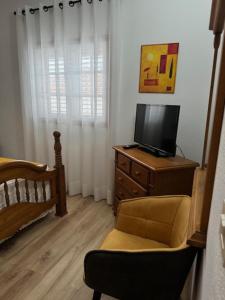 Telewizja i/lub zestaw kina domowego w obiekcie Villa La Era