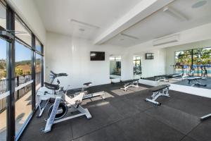 a fitness room with treadmills and cardio machines at Quality Resort Parkhurst in Rockhampton