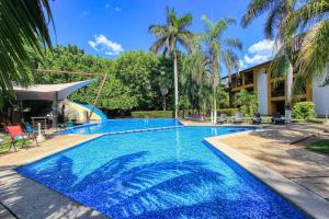 Bazén v ubytování Hotel Ciudad Real Palenque nebo v jeho okolí