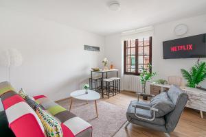 O zonă de relaxare la Grand logement 38m2, Aéroport Paris CDG, Disneyland Paris 20min, Parc Astérix, 1 Chambre, 1 Salon