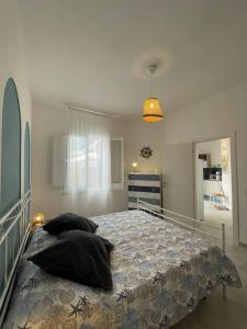 Ένα ή περισσότερα κρεβάτια σε δωμάτιο στο Coralìa