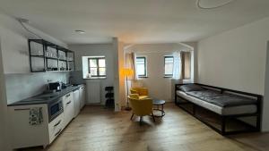 Postel nebo postele na pokoji v ubytování Family Apartments Černice