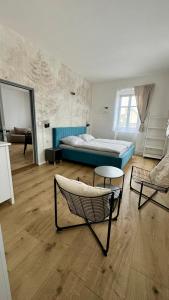 Postel nebo postele na pokoji v ubytování Family Apartments Černice