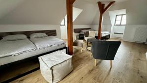 Postel nebo postele na pokoji v ubytování Family Apartments Černice