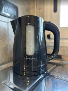 Tiện nghi pha trà/cà phê tại Infinito Grupo Cabaña La Triada +50 ảnh