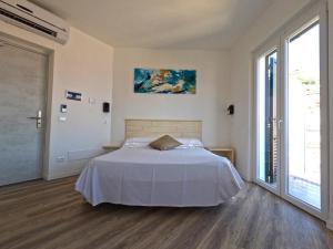 Giường trong phòng chung tại Hotel Week End