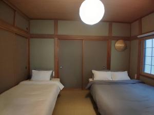 Gyominsou 魚眠荘 #GS1客房内的一张或多张床位