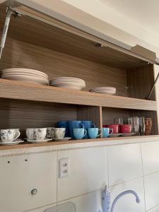 Kuchyň nebo kuchyňský kout v ubytování Apartamento de 2 quartos em condomínio com portaria 24h e localização excelente + 4 fotografie