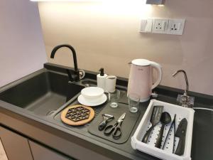 Η κουζίνα ή μικρή κουζίνα στο BTC The Curvena Bangsar South Mid Valley