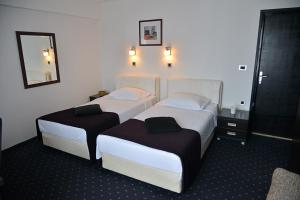 Ένα ή περισσότερα κρεβάτια σε δωμάτιο στο Guest House Amico