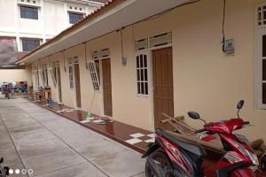 Fotografie z fotogalerie ubytování Hotel O Guest House Wijaya Syariah Near alun alun kota purwokerto v destinaci Purwokerto + 40 fotografií