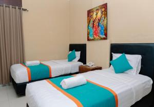 Postel nebo postele na pokoji v ubytování Dante Guesthouse