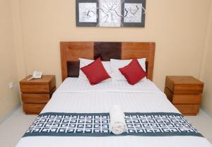 Postel nebo postele na pokoji v ubytování Dante Guesthouse