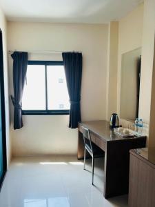 Postel nebo postele na pokoji v ubytování Royal Waves Hotel