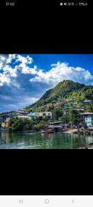 a view of a river with a mountain in the background at Résidence Rayanil in Chiconi