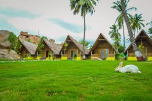 En hage utenfor Tamarind Tree Way Side Amenities