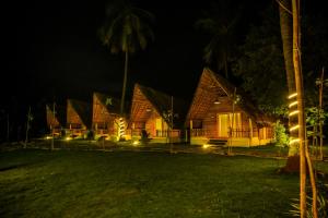 En hage utenfor Tamarind Tree Way Side Amenities