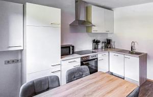 Una cocina o cocineta en Ferienwohnung - Roppen
