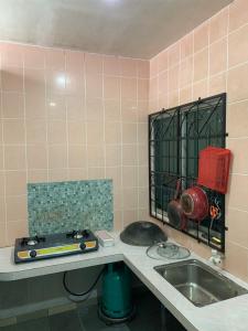 Dapur atau dapur kecil di ARIDAWA Homestay