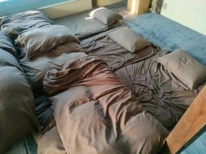 Postel nebo postele na pokoji v ubytování INN Sodeshi 丹後 一棟貸し 海の宿 INN袖志