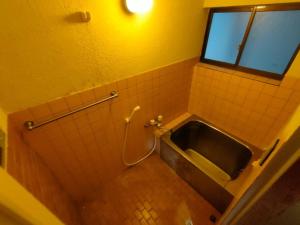 Koupelna v ubytování INN Sodeshi 丹後 一棟貸し 海の宿 INN袖志