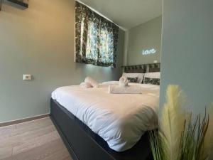Posteľ alebo postele v izbe v ubytovaní Rooftop Apartment with Garden in Ioannina