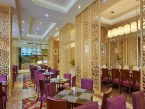 Χώρος καθιστικού στο Grand New Century Hotel Binhai Tianjin