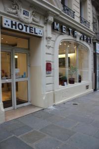 a hotel sign on the side of a building at Metropol in Paris