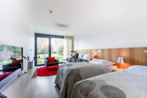 Voodi või voodid majutusasutuse Yard Resort toas