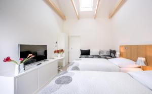 Voodi või voodid majutusasutuse Yard Resort toas