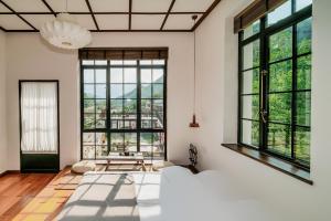 Снимка в галерията на 北京山涧旧时山景花园民宿 в Zhangfang