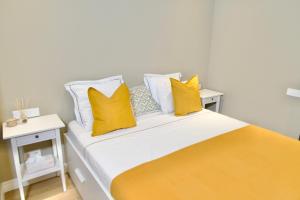 Ένα ή περισσότερα κρεβάτια σε δωμάτιο στο Sweet Apartment
