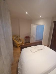 Postel nebo postele na pokoji v ubytování Résidence les jardins