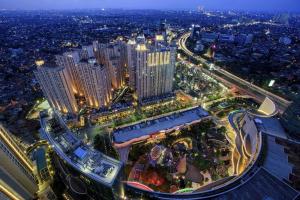 an aerial view of a city at night at Blue Sky Hotel Petamburan in Jakarta